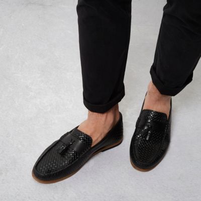 Black embossed weave tassel loafers